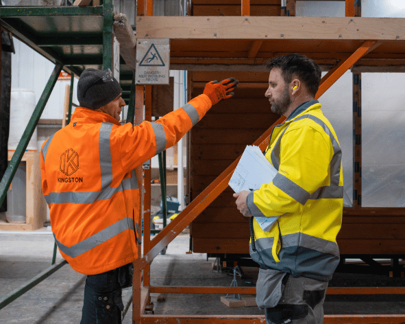 hi vis workwear being used in a transport and logistics setting