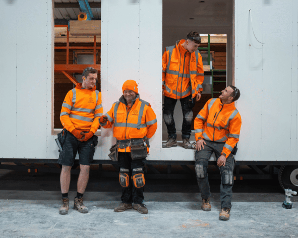 hi vis workwear being used in a construction setting