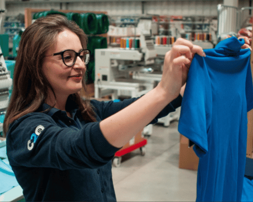 Clothes2order operator carefully checking an embroidery