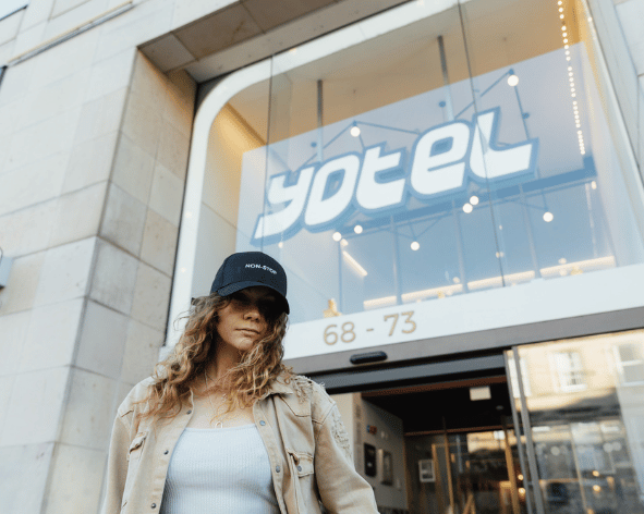 Yotel cap embroidered by Clothes2order being worn