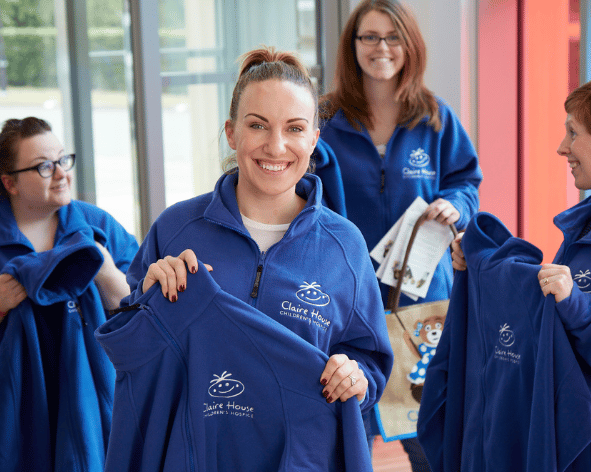 Embroidered fleeces being used in a healthcare setting